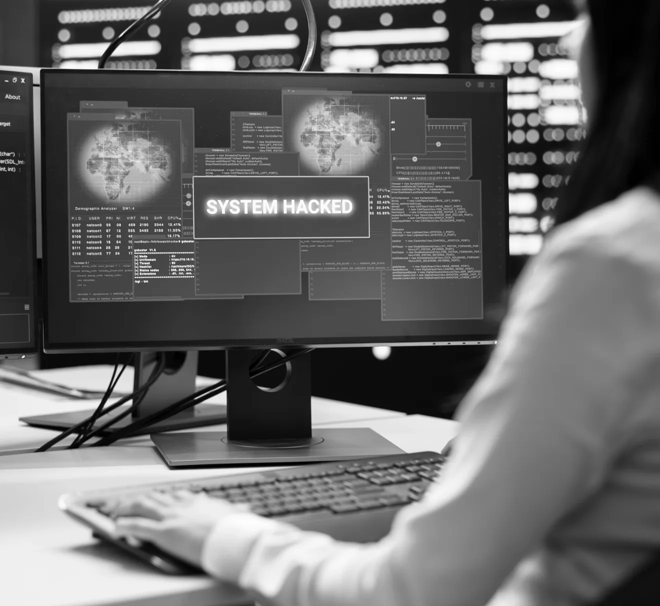 A woman sitting in front of a hacked endpoint that she cannot access.